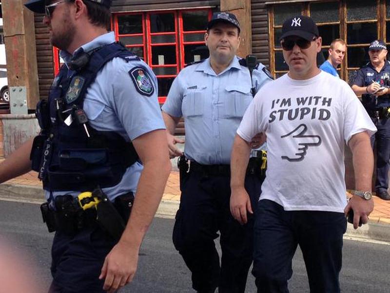 Australian man arrested for wearing &#039;I&#039;m with Stupid&#039; shirt at political event