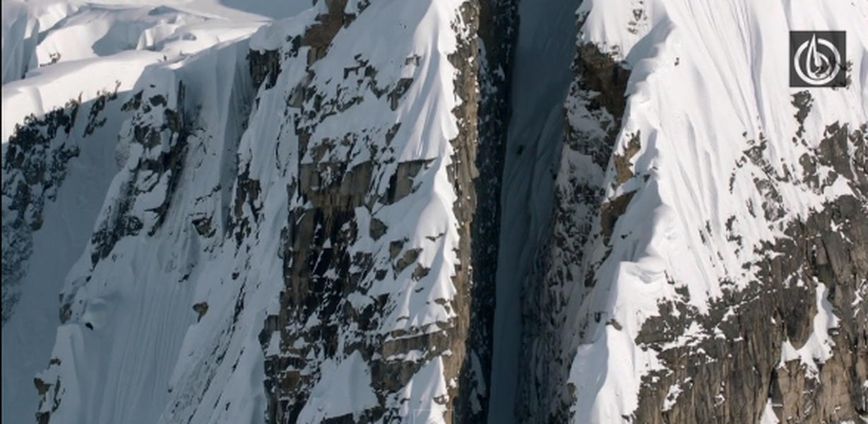Watch jaw-dropping footage of a skier racing down an insanely narrow mountain chute