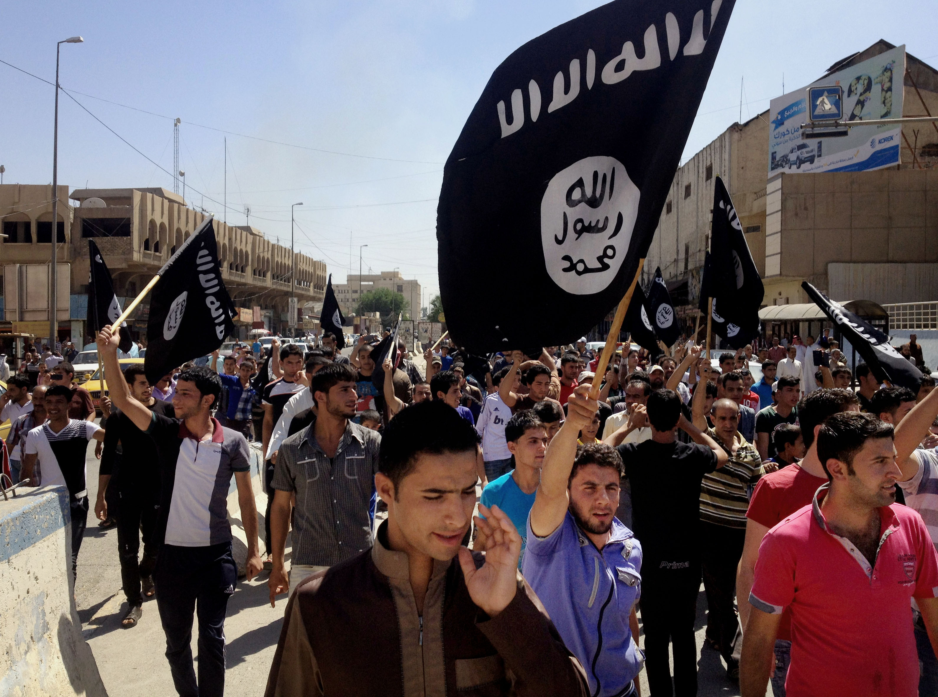 This file photo from 2014 shows ISIS supporters in Mosul, Iraq.