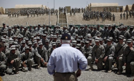 U.S. Secretary of Defense Robert Gates addresses troops stationed in Afghanistan: The final costs of the Afghanistan and Iraq wars could reach $4.4 trillion.