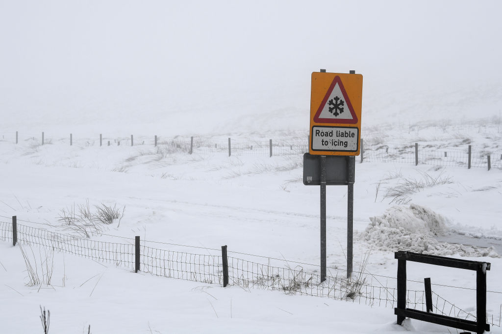 A road sign warning of icy roads in Scotland.