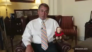 Watch John Boehner play with, identify with his squawking wind-up monkey