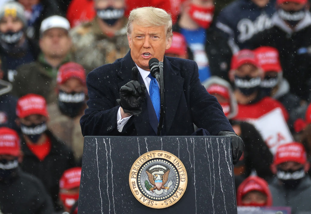 President Donald Trump addresses thousands of supporters during a campaign rally at Capital Region International Airport October 27, 2020 in Lansing, Michigan.