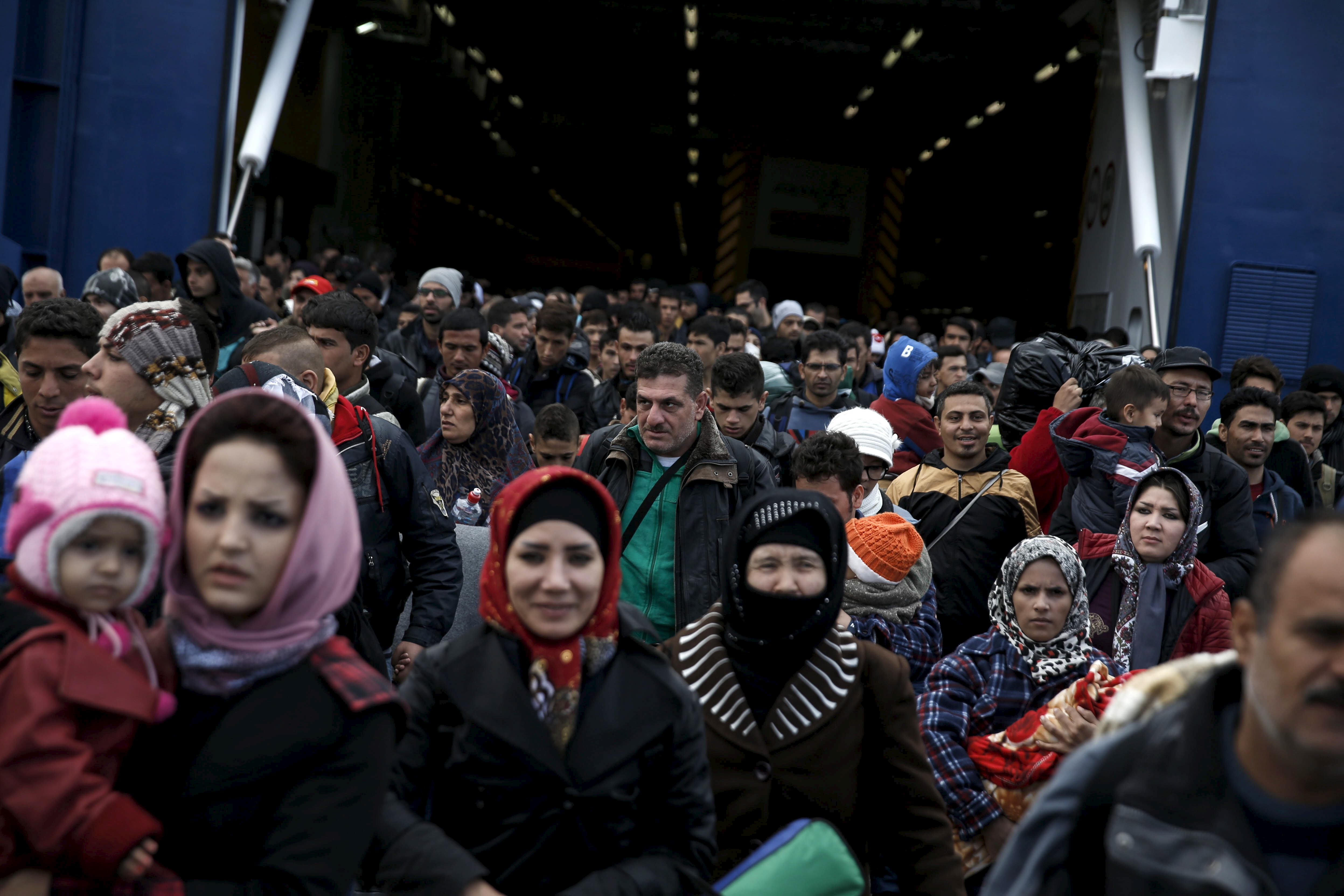 Refugees and migrants arrive in Greece.