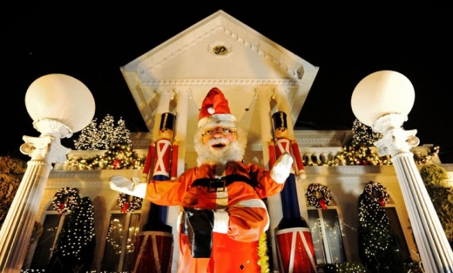 Ho, ho, ho: A giant Santa Claus sits in front of a house in the Dyker Heights neighborhood of Brooklyn.