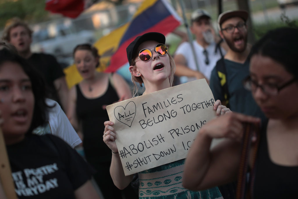 Demonstrators hold a rally in the Little village neighborhood calling for the elimination of the U.S. Immigration and Customs Enforcement (ICE) and an end to family detentions on June 29, 201