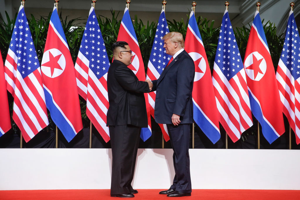 Trump Kim Jong-un handshake.