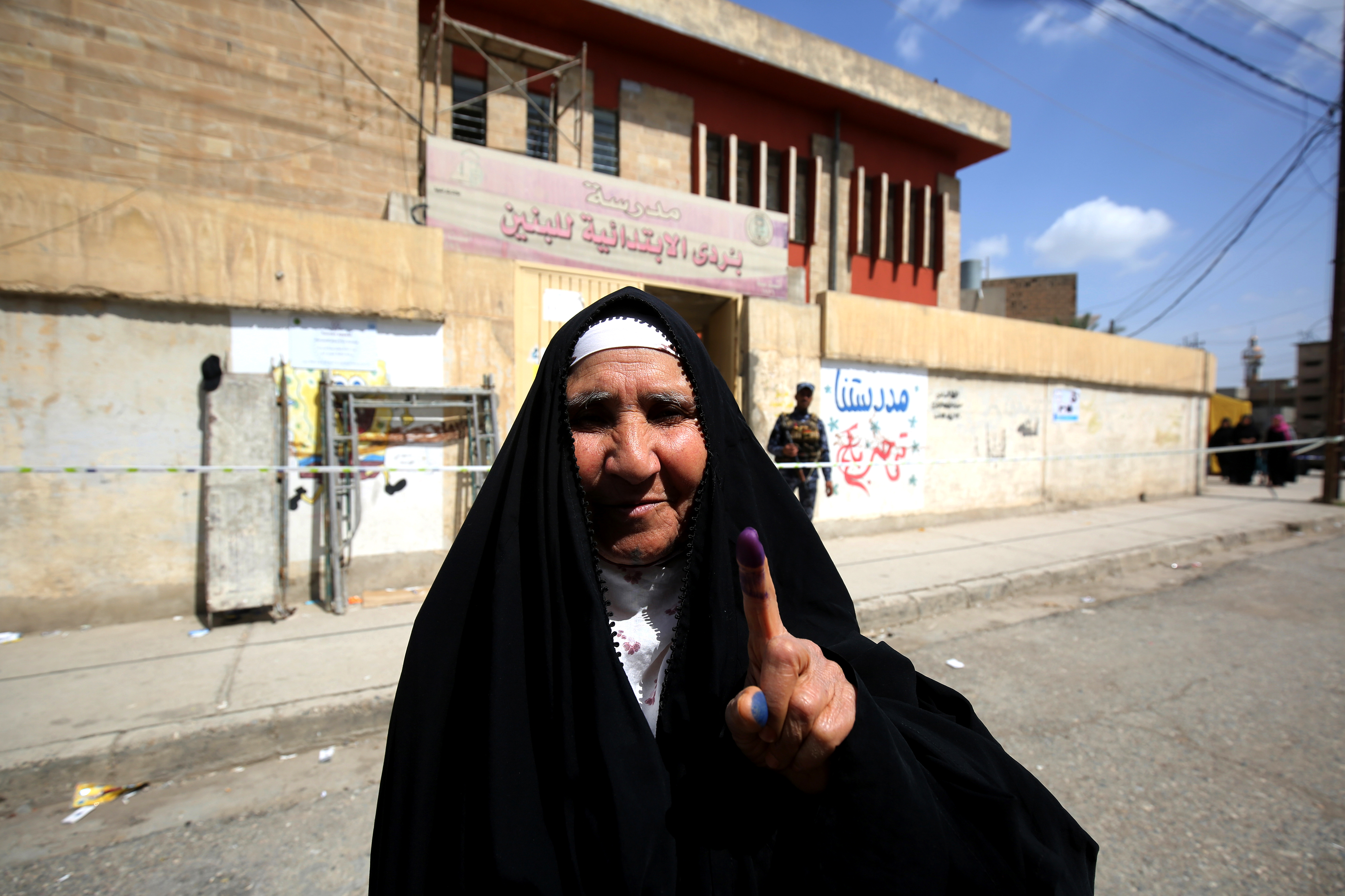 A voter in Mosul.