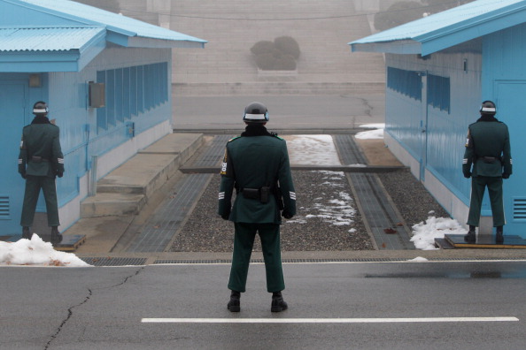 South Korean soldiers stand watch at the demilitarized zone.