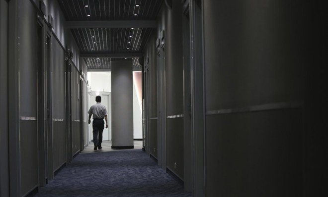 A man walks in a lobby at the capsule hotel Air Express in Moscow&#039;s Sheremetyevo Airport, where NSA leaker Edward Snowden has reportedly spent some time.
