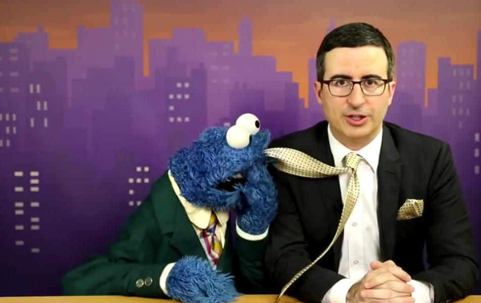 John Oliver and Cookie Monster anchor a twisted, family-friendly newscast