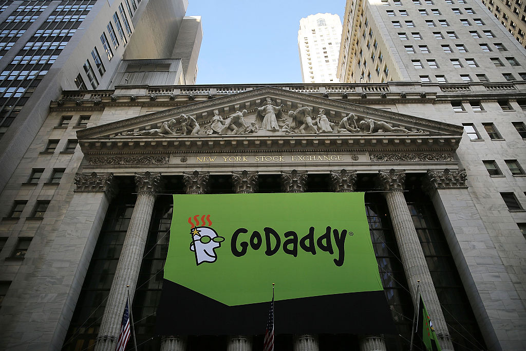 GoDaddy banner in front of New York Stock Exchange.