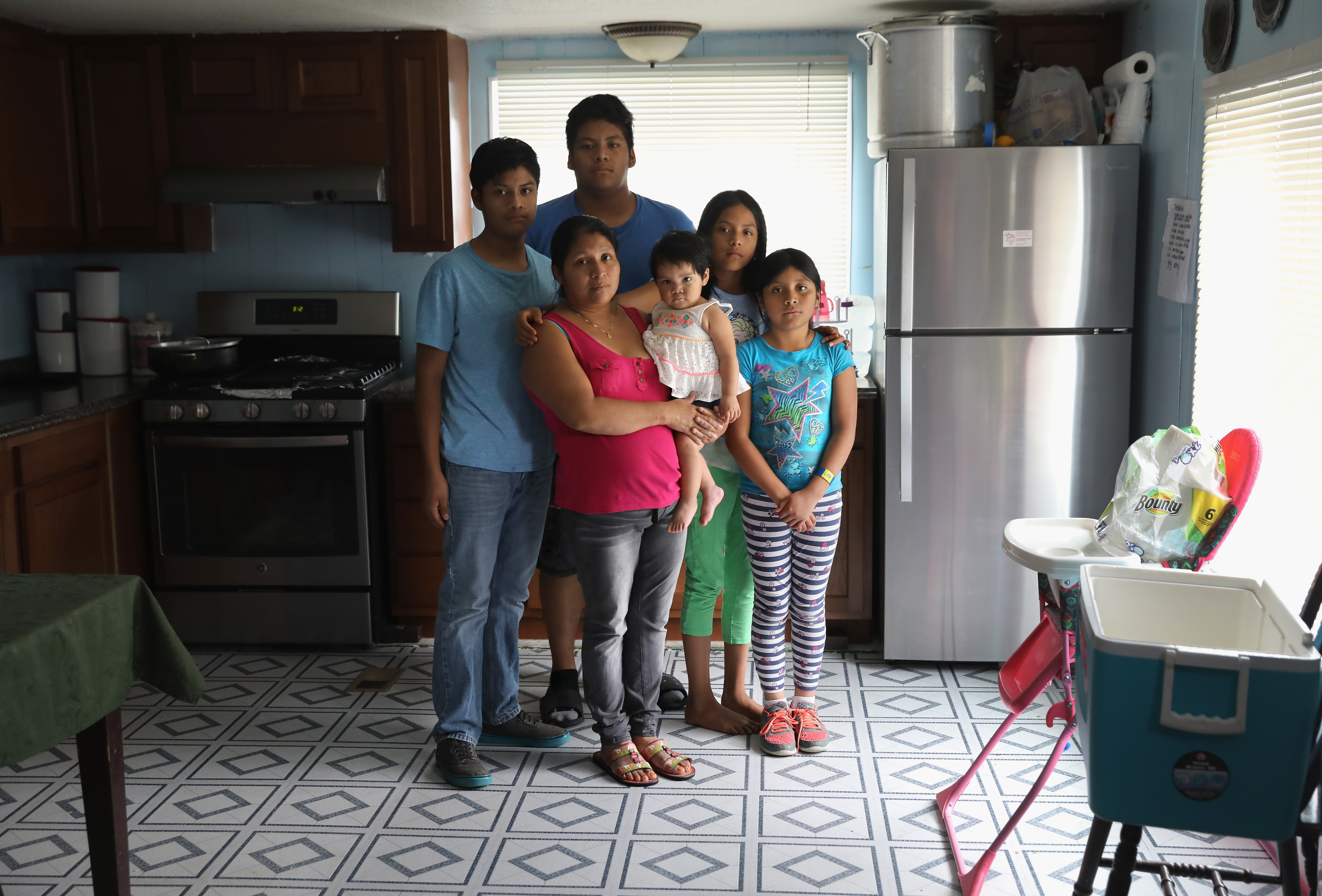 Guadalupe Lopez (center), an undocumented immigrant from Mexico, and her five U.S.-born children.