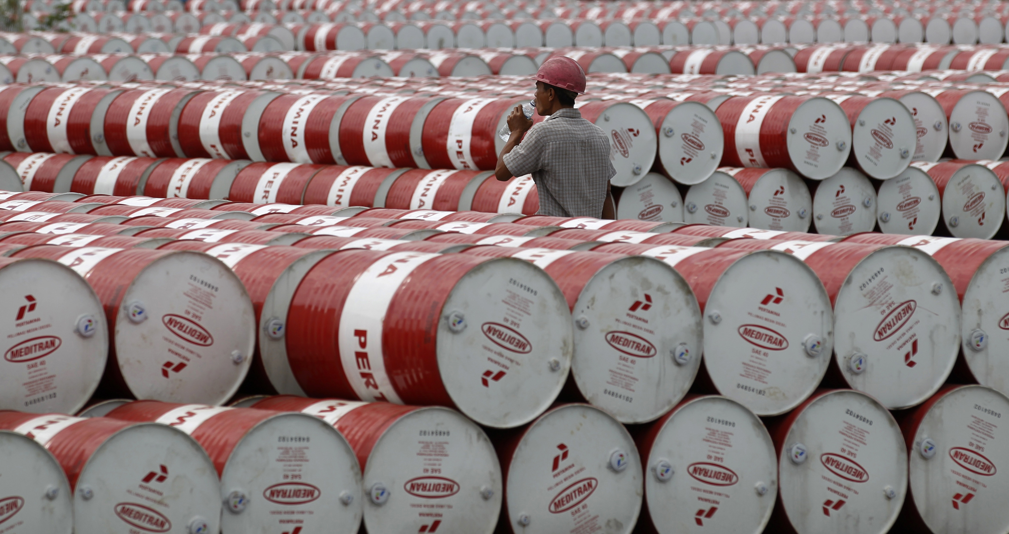 Oil barrels at a storage depot in Jakarta, Indonesia.