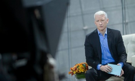 A casual Anderson Cooper entered the daytime talk show arena on Monday, and critics say the globe-trotting reporter will have to get even more personal to gain a loyal following.