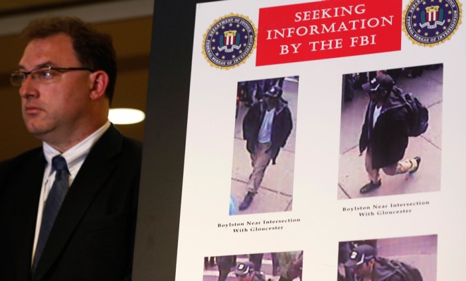 Photos of the Boston Marathon suspects during an FBI briefing on April 18.