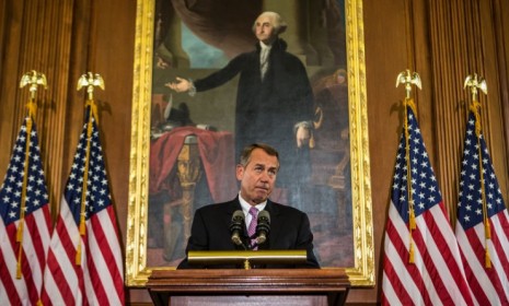 House Speaker John Boehner (R-Ohio) discusses the looming fiscal cliff on Capitol Hill on Nov. 7, asking President Obama to work with House Republicans.