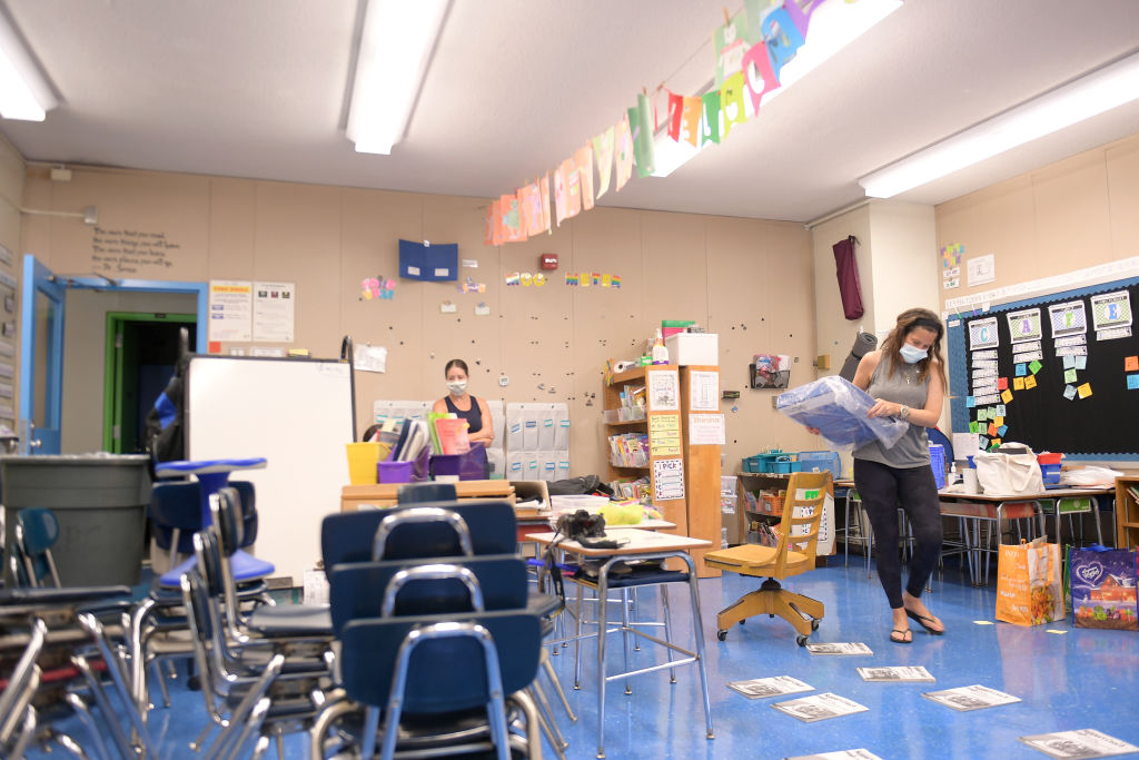 Teachers Nancy Rastetter and Marisa Wiezel, who is related to the photographer, prepare for the 2020/2021 school year in Wiezel&#039;s classroom at Yung Wing School P.S. 124 on August 25, 2020 in 