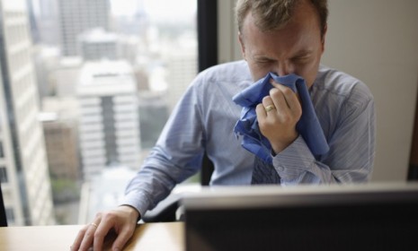 Only 60 percent of private sector employees get paid when they stay home sick, which can mean more people come into the office bearing germs.