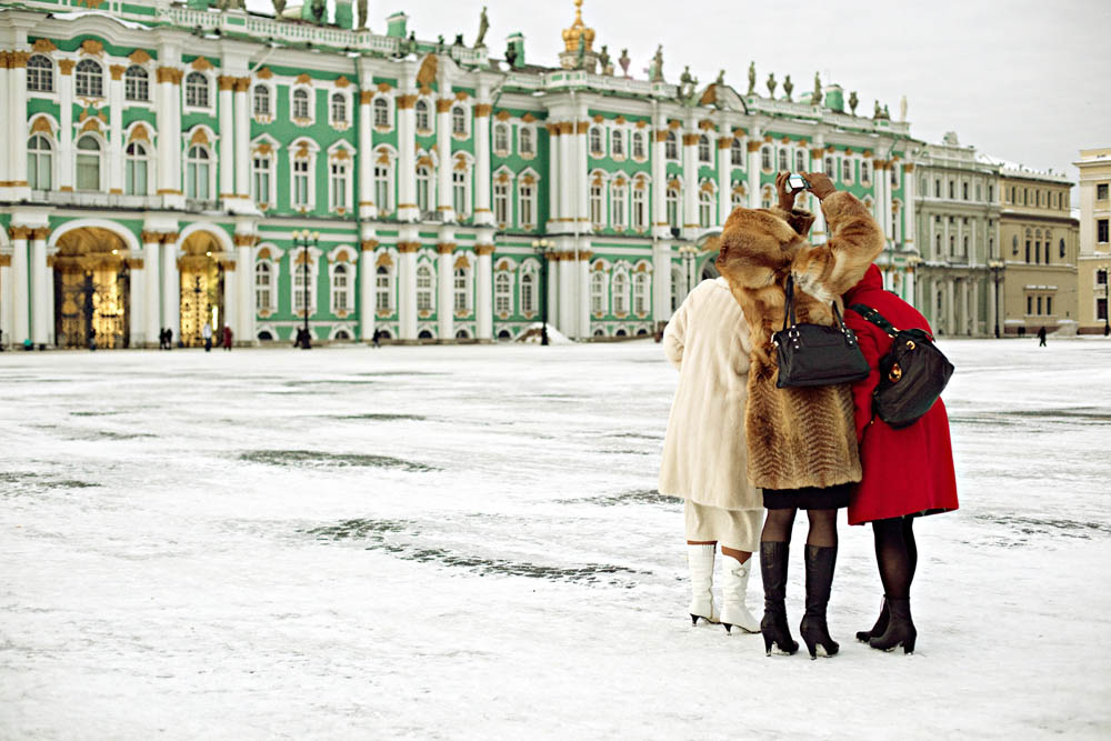 Huddling for a photo outside the Winter Palace in St. Petersburg, Russia.
