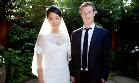 Facebook founder Mark Zuckerberg married his longtime girlfriend Priscilla Chan on Saturday, just one day after shares of his company began trading for $38 each.