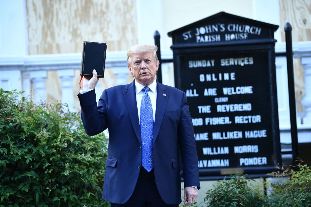 Trump holds a Bible