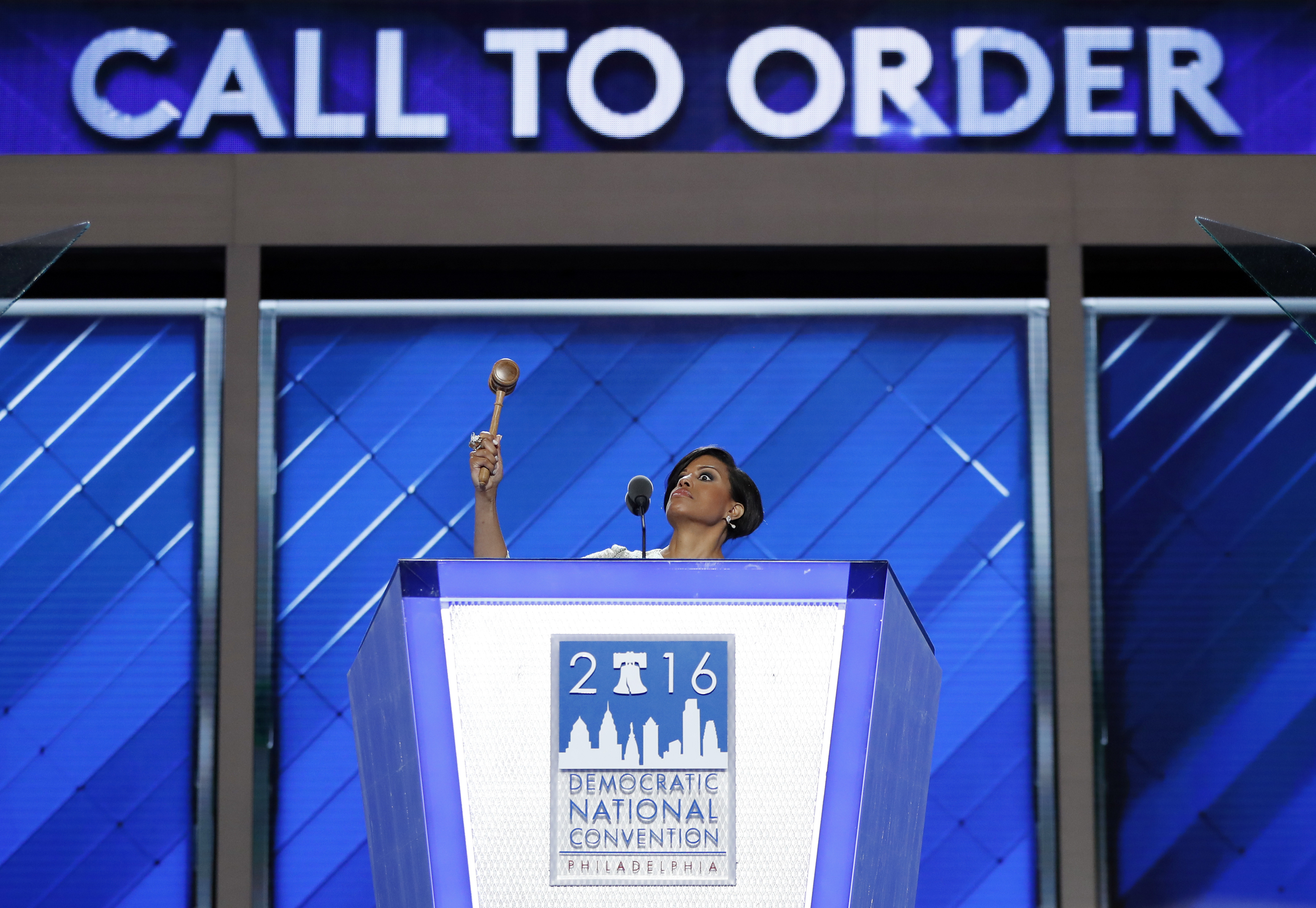 Baltimore Mayor Stephanie Rawlings-Blake raises the gavel as she calls the convention to order.