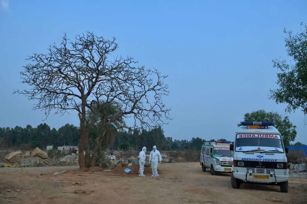Ambulance carrying bodies of COVID-19 victims in India.