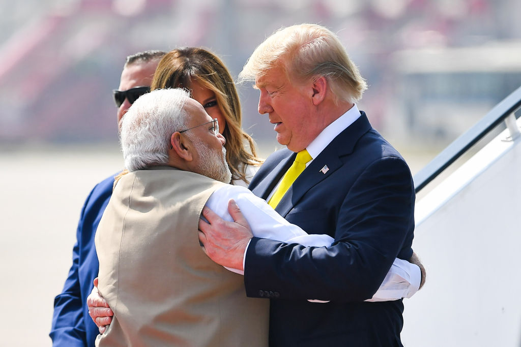 Trump is greeted in India by Prime Minister Narendra Modi