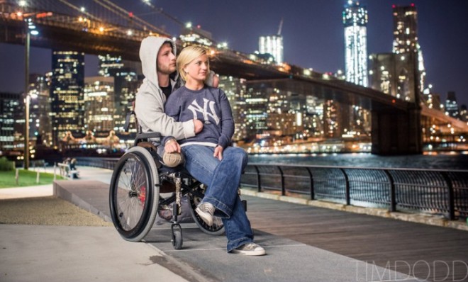 Taylor Morris, a Navy veteran and quadruple amputee, sits with his girlfriend Danielle Kelly in New York City.