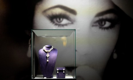 Elizabeth Taylor&#039;s La Peregrina necklace, which features a rare 50.6 carat pearl, sold for $11.8 million Tuesday.