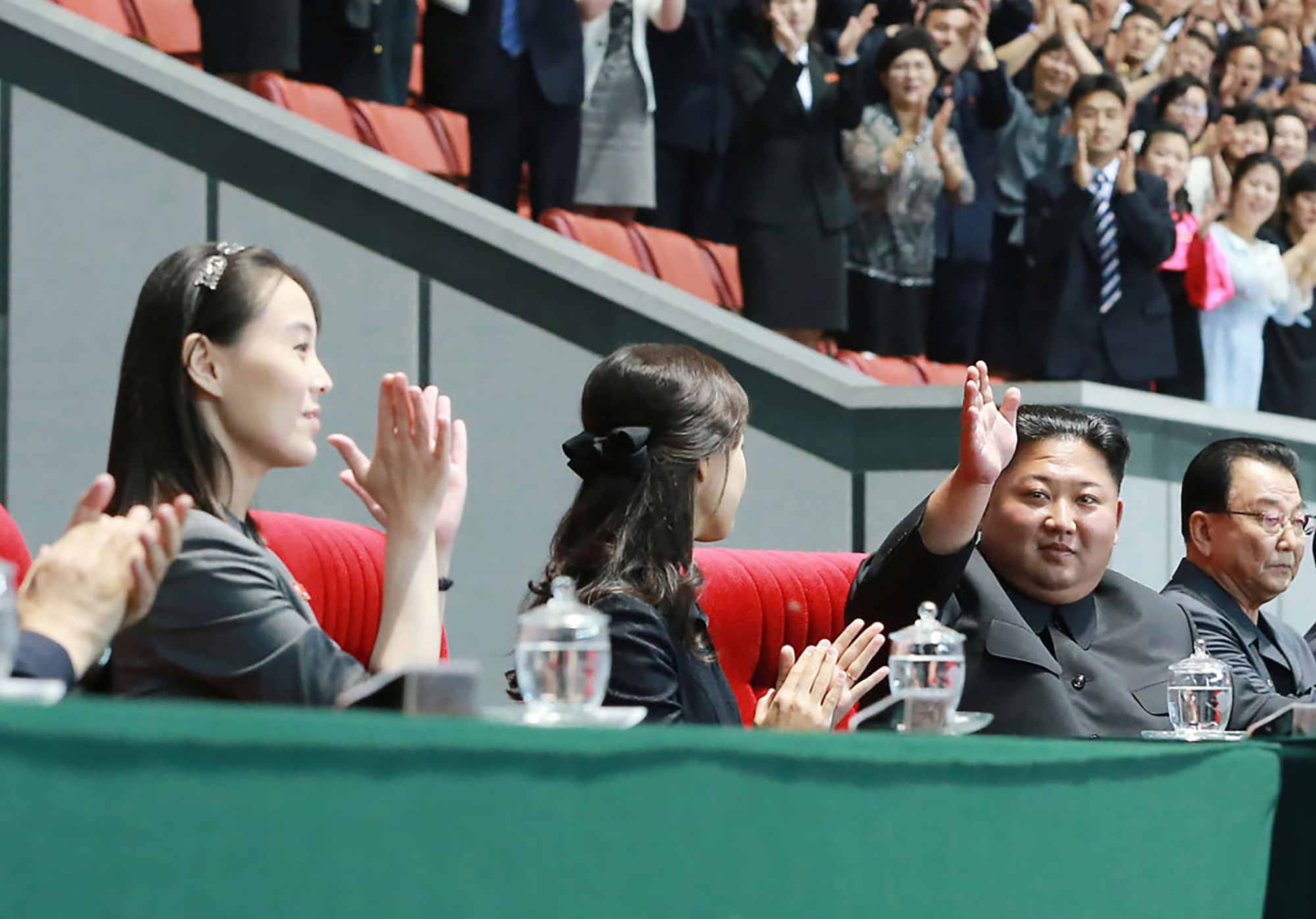 Kim Yo Jong, left, with her sister-in-law and brother Kim Jong Un.