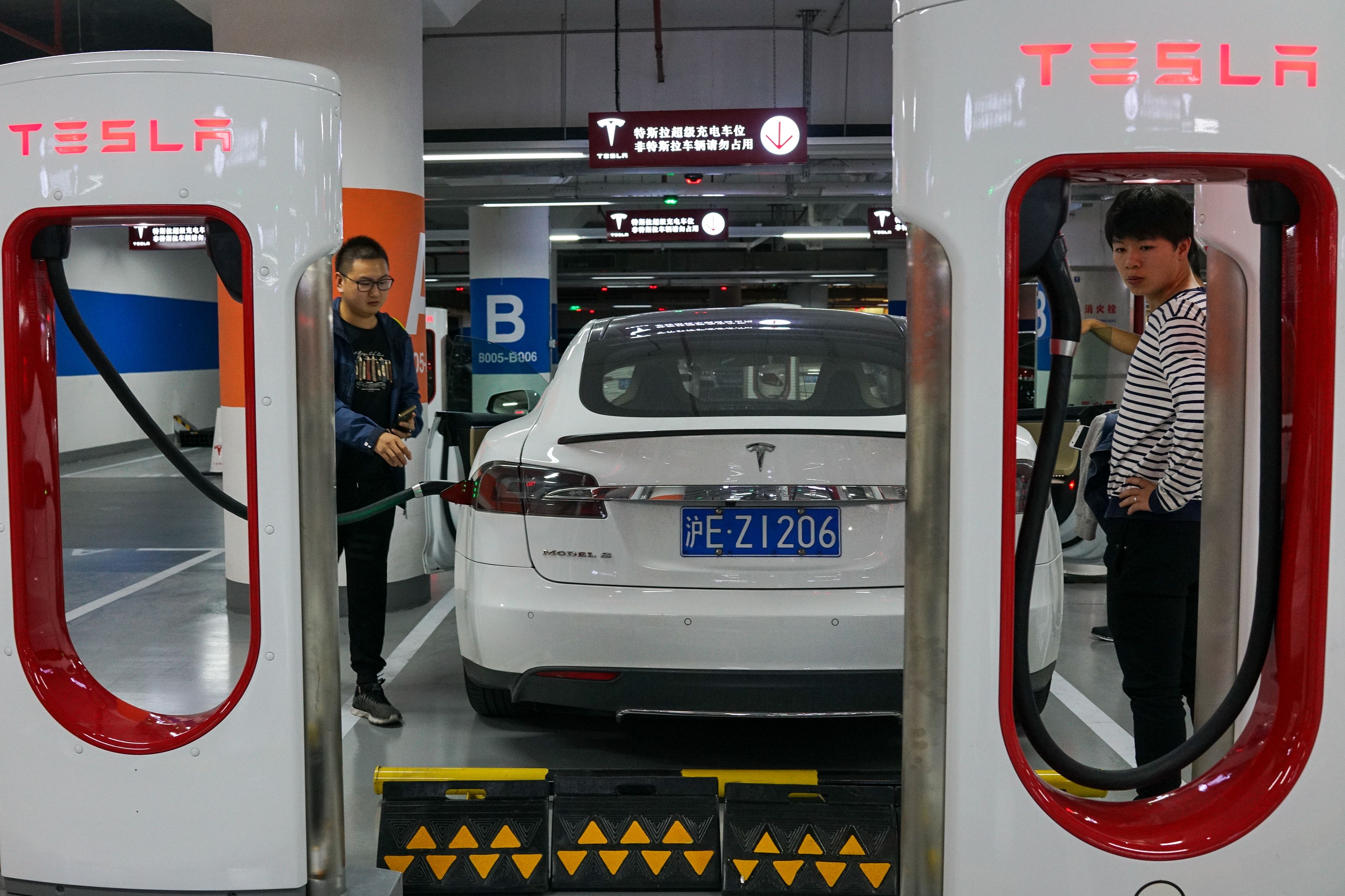 Tesla vehicles charge in Shanghai