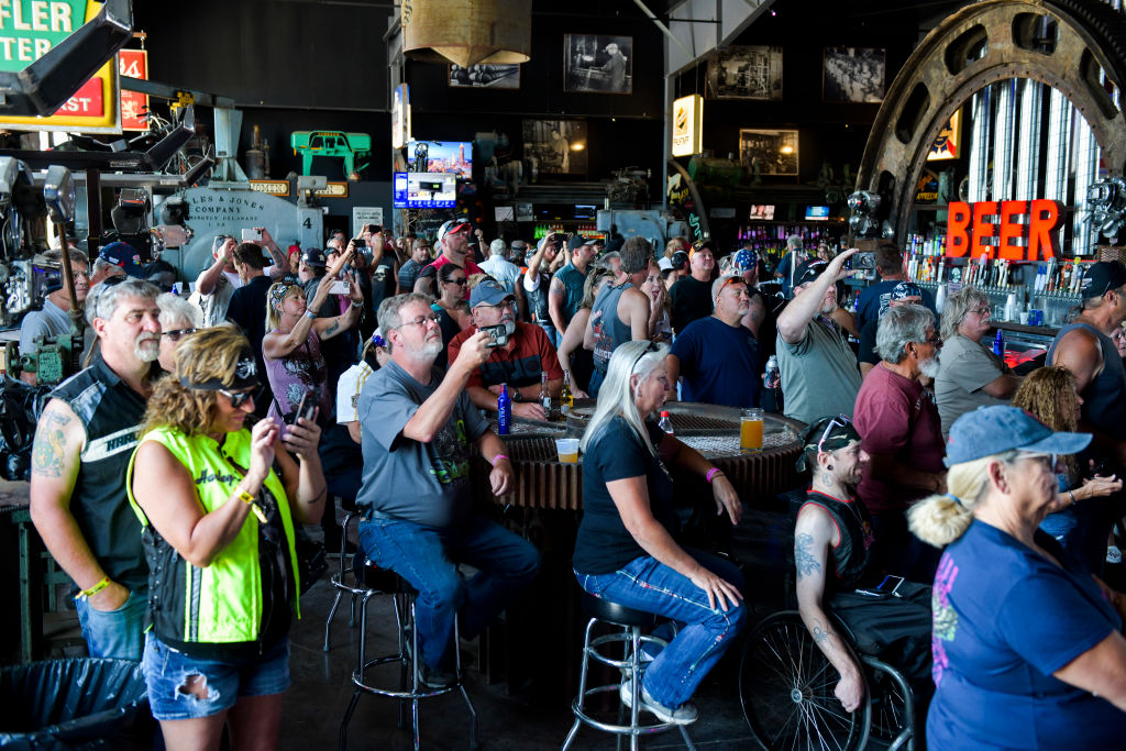People watch a concert at the Full Throttle Saloon during the 80th Annual Sturgis Motorcycle Rally in Sturgis, South Dakota on August 9, 2020.