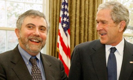 New York Times columnist Paul Krugman poses with then-President George W. Bush in 2008: The liberal writer has kicked off a frenzy of debate when he recently acknowledged he doesn&#039;t read many