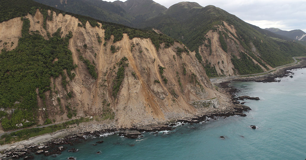 Huge slips, caused by the 7.5 earthquake, are seen blocking State Highway One north of Kaikoura on November 14, 2016 in New Zealand