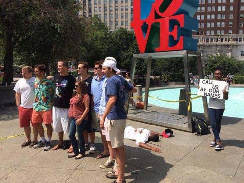 Black artist poses as dead body at Philly&#039;s &#039;Love&#039; sculpture, tourists continue taking photos