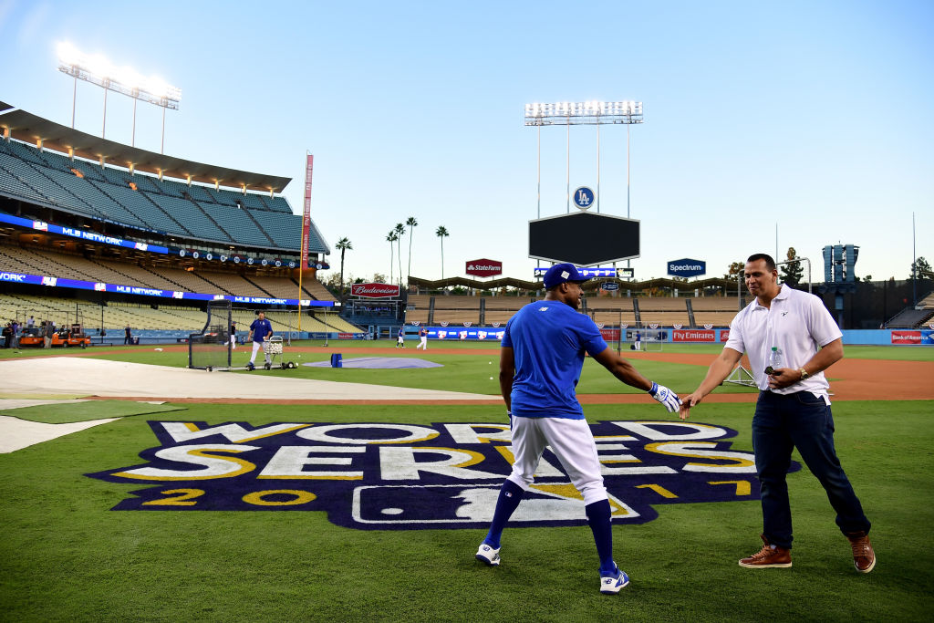 Curtis Granderson of the LA Dodgers talks with Alex Rodriguez of Fox Sports.