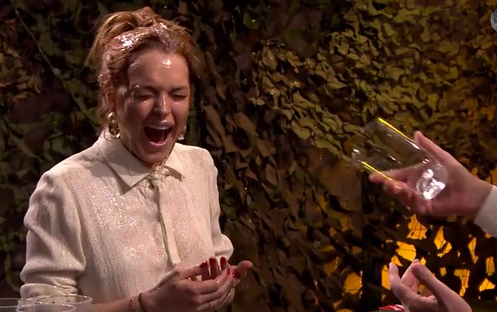 Watch Lindsay Lohan and Jimmy Fallon aggressively throw water at each other