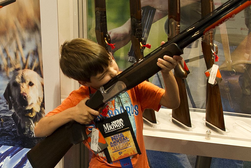 A kid with a gun. 