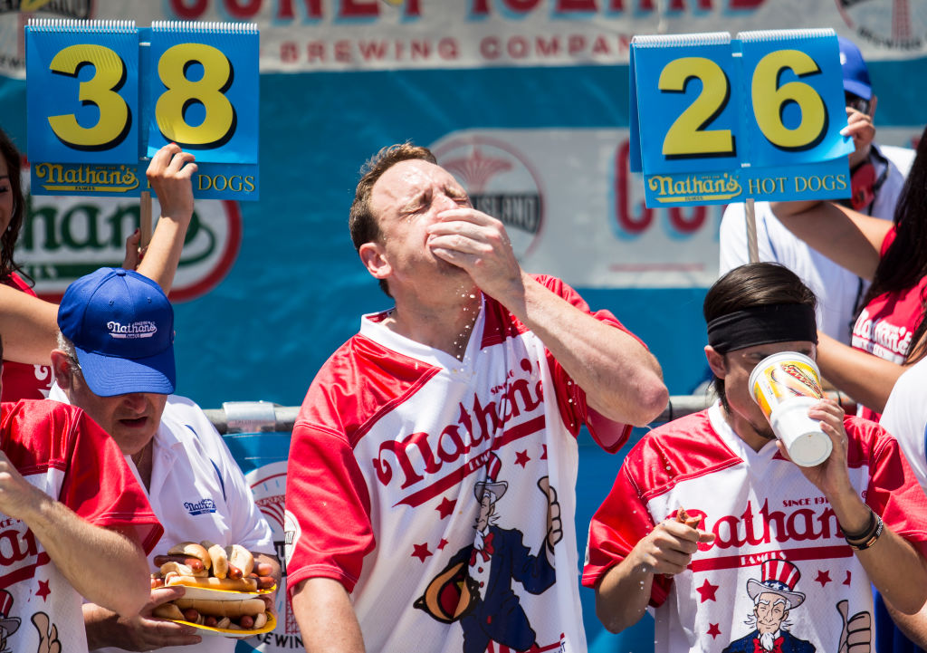 Joey Chestnut eats a hot dog in 2017.
