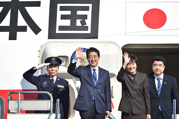 Shinzo Abe boards his plane in Japan to fly to New York City.