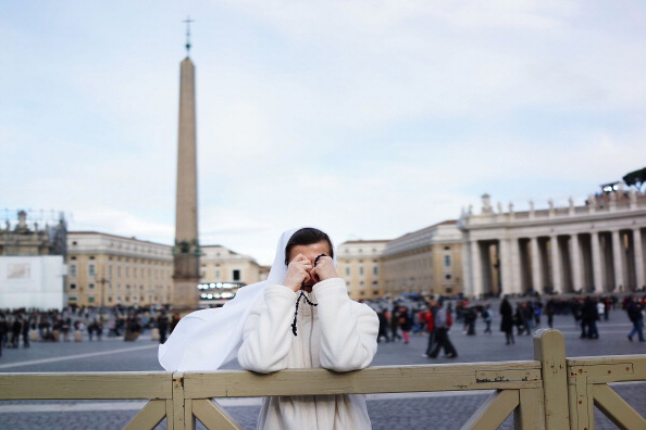 A nun prays in St. Peter&#039;s Square 