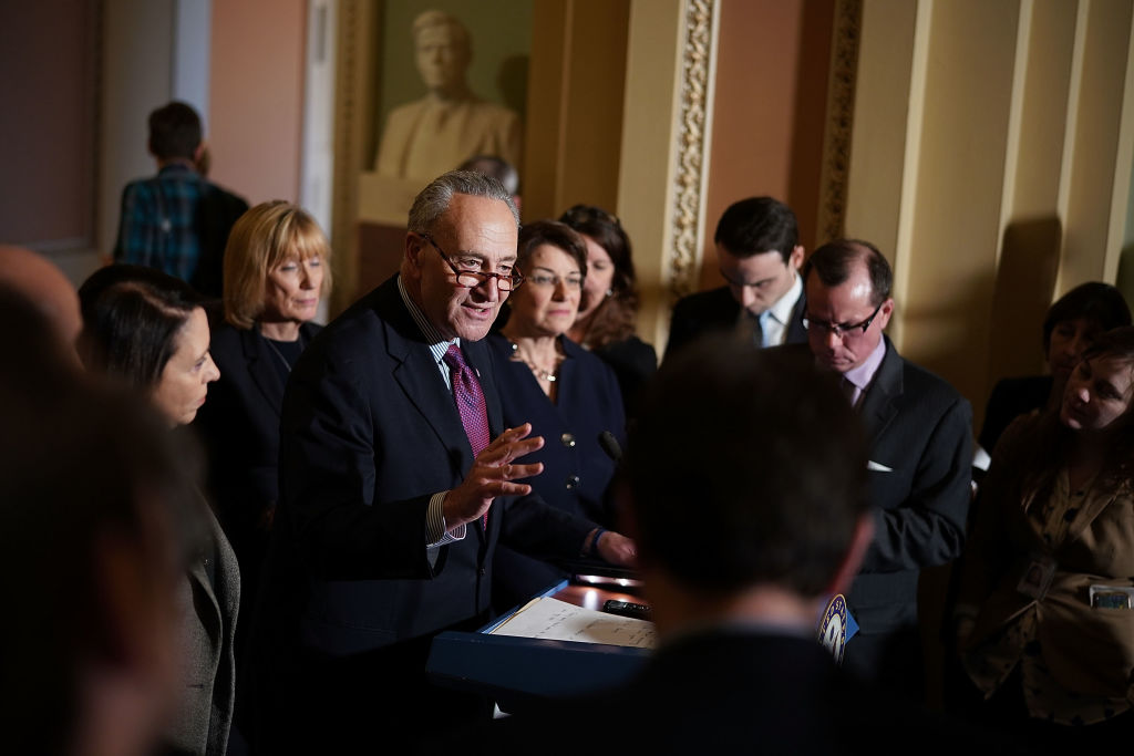 Chuck Schumer with other Democrats.