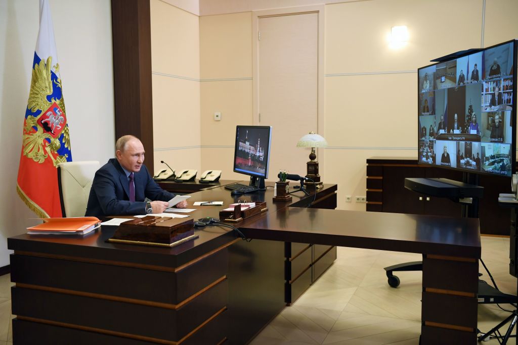 Putin works at his home office