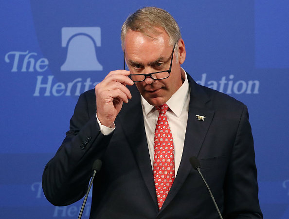Zinke speaks to criticism of his travels.