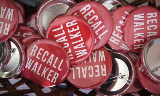 &quot;Recall Walker&#039; pins sit in a basket in the Rock County Democratic Party Headquarters on June 4. Wisconsin Gov. Scott Walker survived.