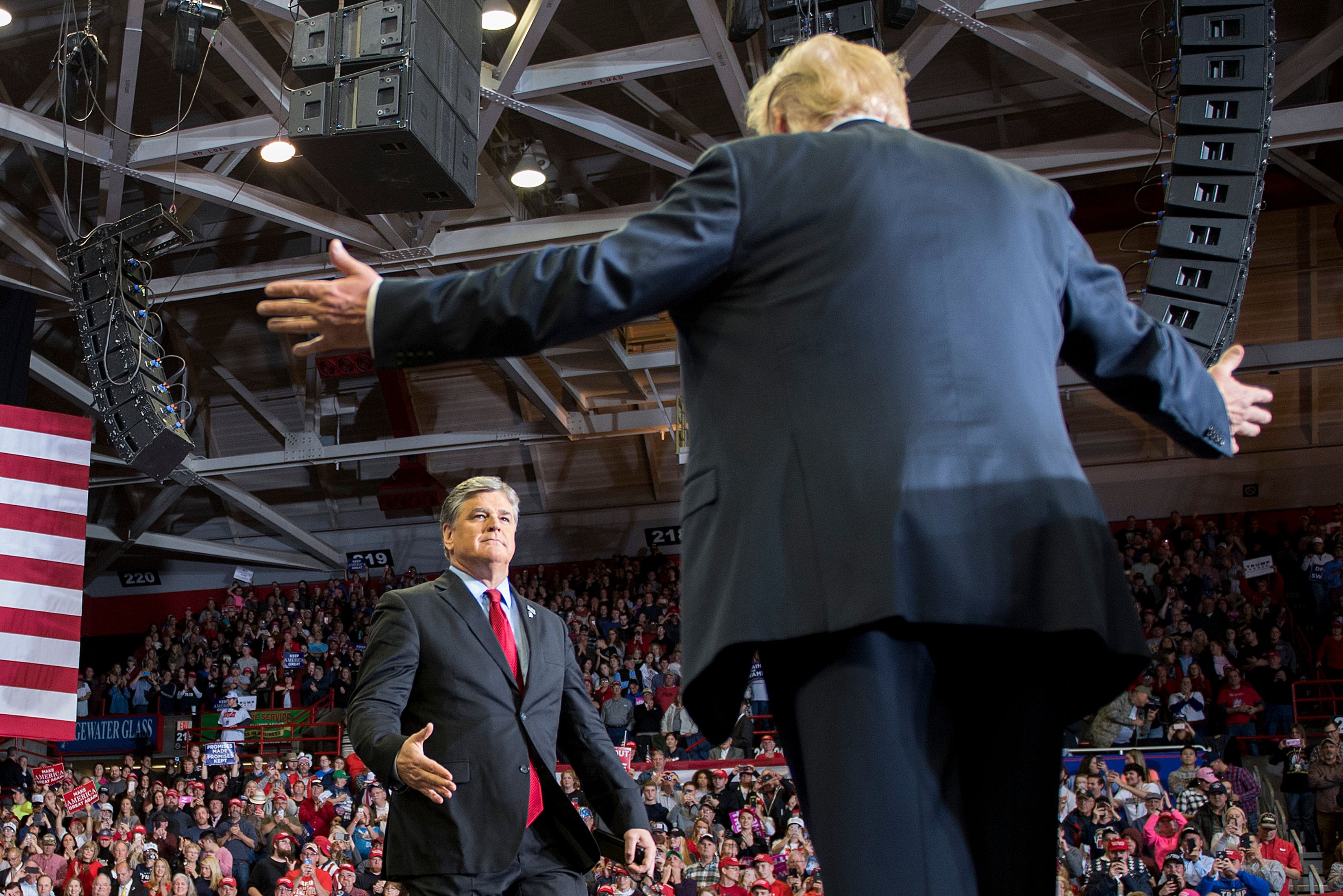 Trump embraces Sean Hannity at a Missouri rally