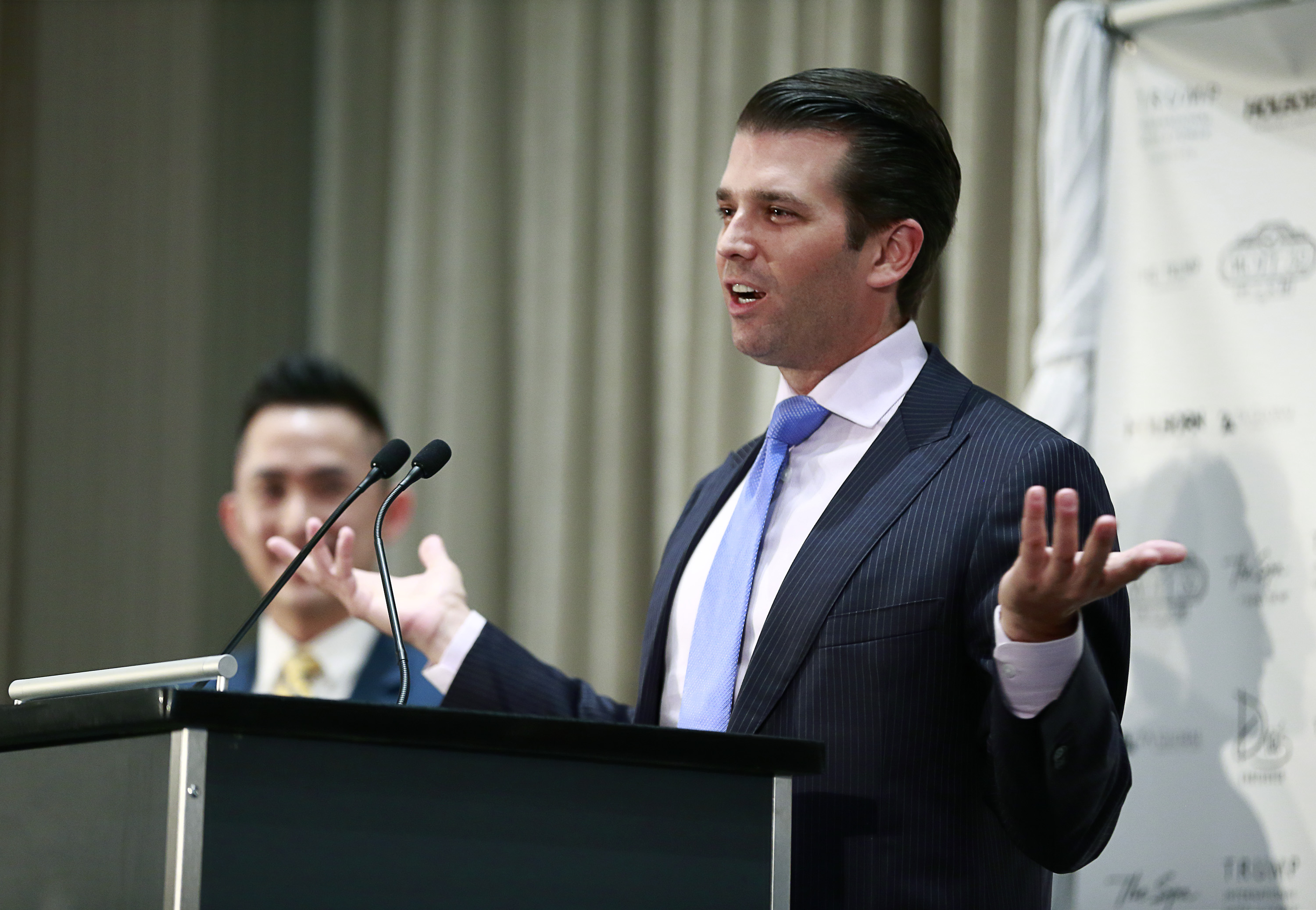 Donald Trump Jr. speaks at a hotel opening in Vancouver