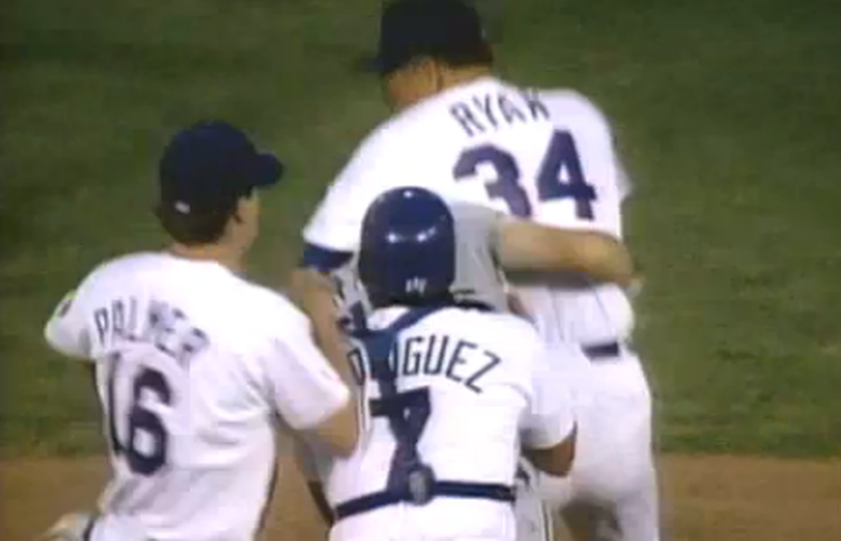 Watch a 46-year-old Nolan Ryan repeatedly punch a dude in the face for charging the mound